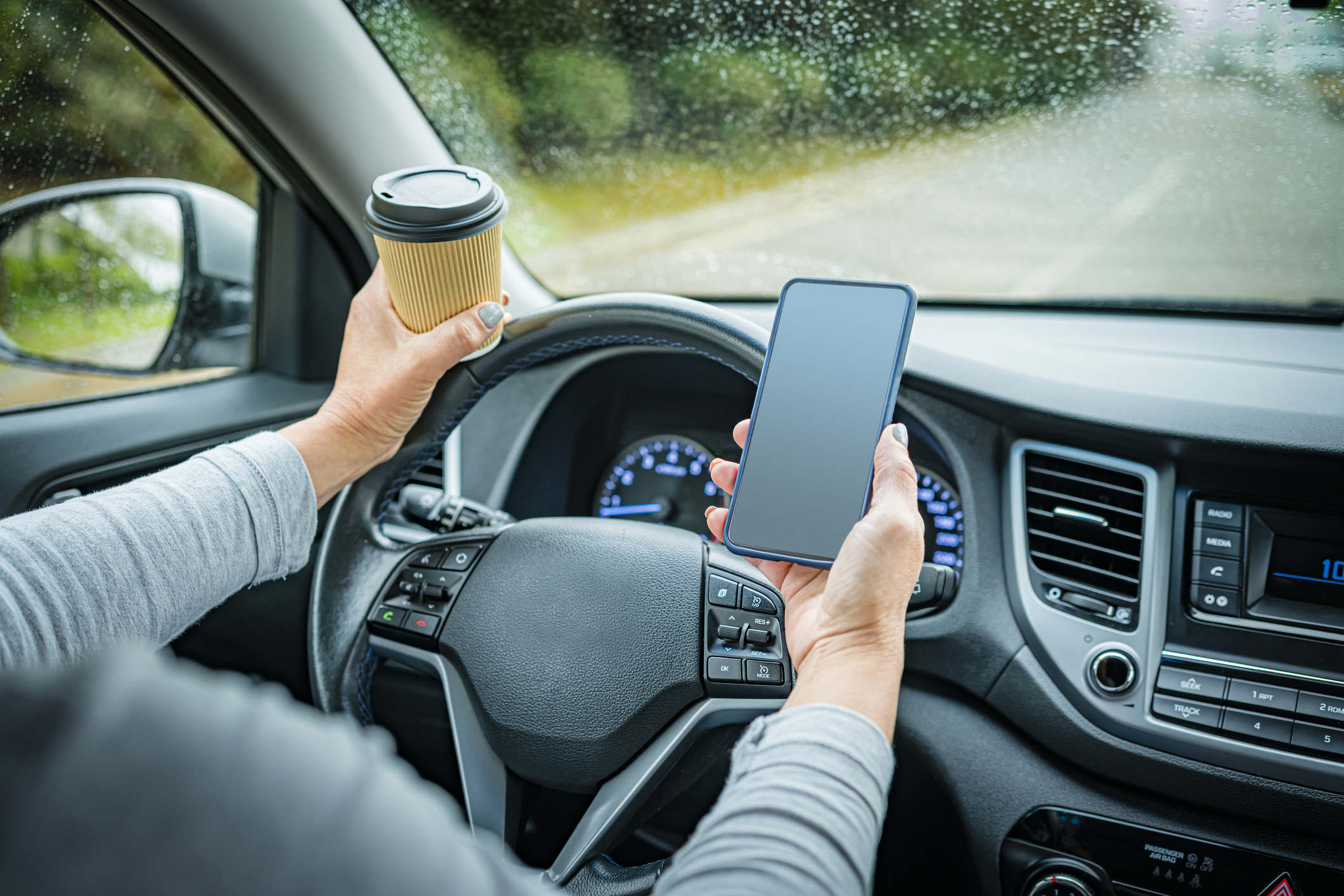 distracted driver looking at phone